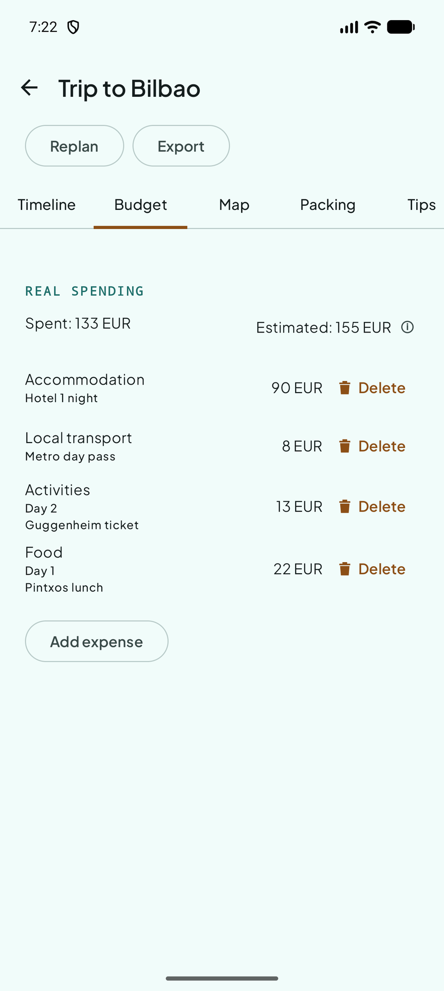 Budget screen showing real spending logged against the estimated total.